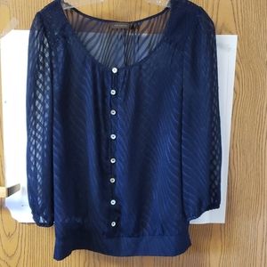 Limited shear navy blue top.